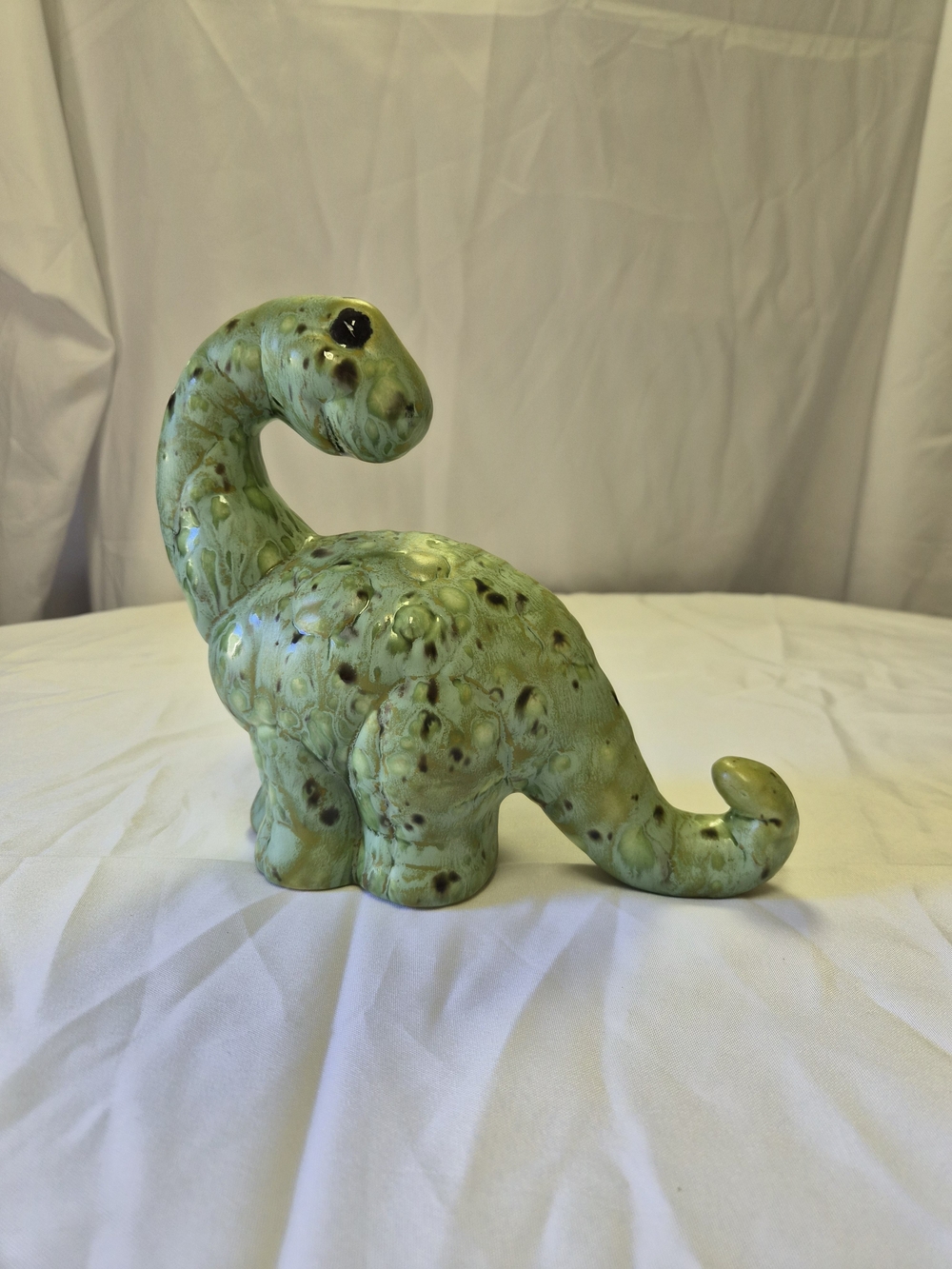 Hand-painted ceramic dinosaur figurine